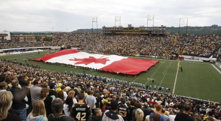Canadian Flag on the field. September 6, 2010; Hamilton, ON, Canada; Hamilton Tiger-Cats defeat the Toronto Argonauts 28-13 at Ivor Wynne Stadium. Photo/mandatory credit John E. Sokolowski